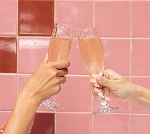img-glasses Two champagne glasses clinking. Check out our daily specials at Orange Blossoms!